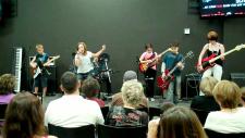 Students performing at 2011 Music & Rock School summer concert